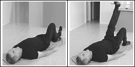 man doing hamstring exercises on floor